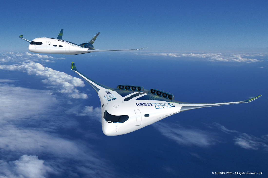 Zwei weiße Flugzeuge fliegen über den Wolken