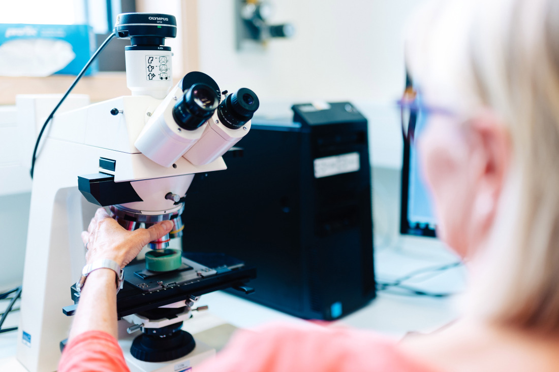 Woman with a microscope